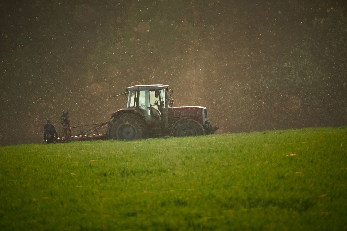 Agricultural tractor in a field